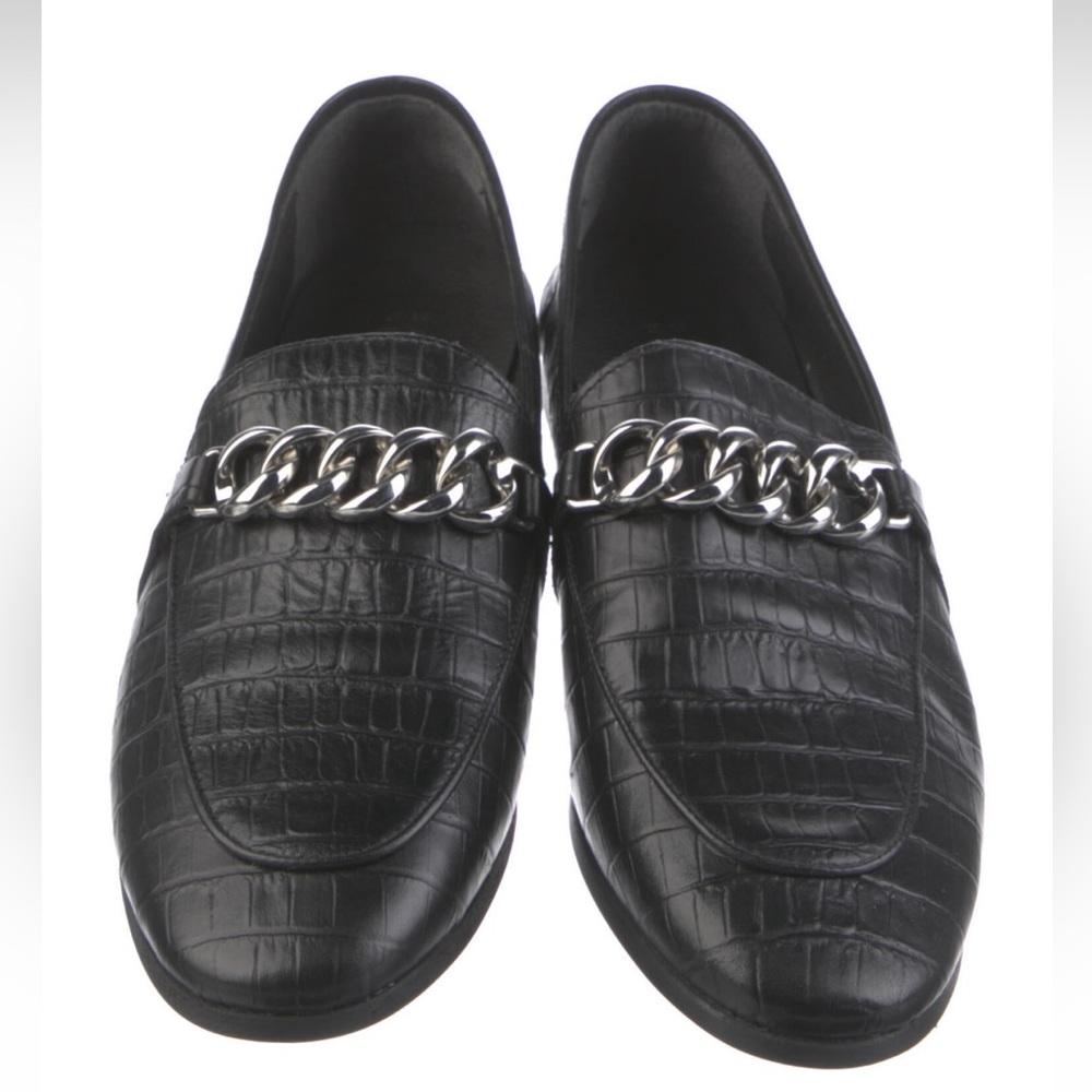 Size 38 black leather with silver hardware